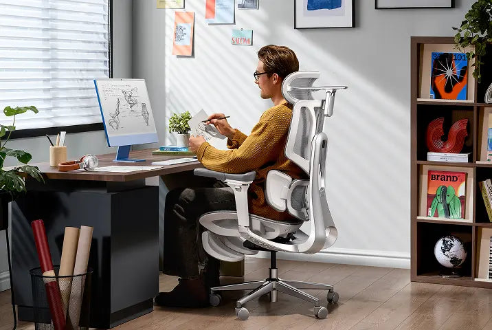 HBADA big and tall ergonomic office chair in a modern workspace setup for long-hour productivity.