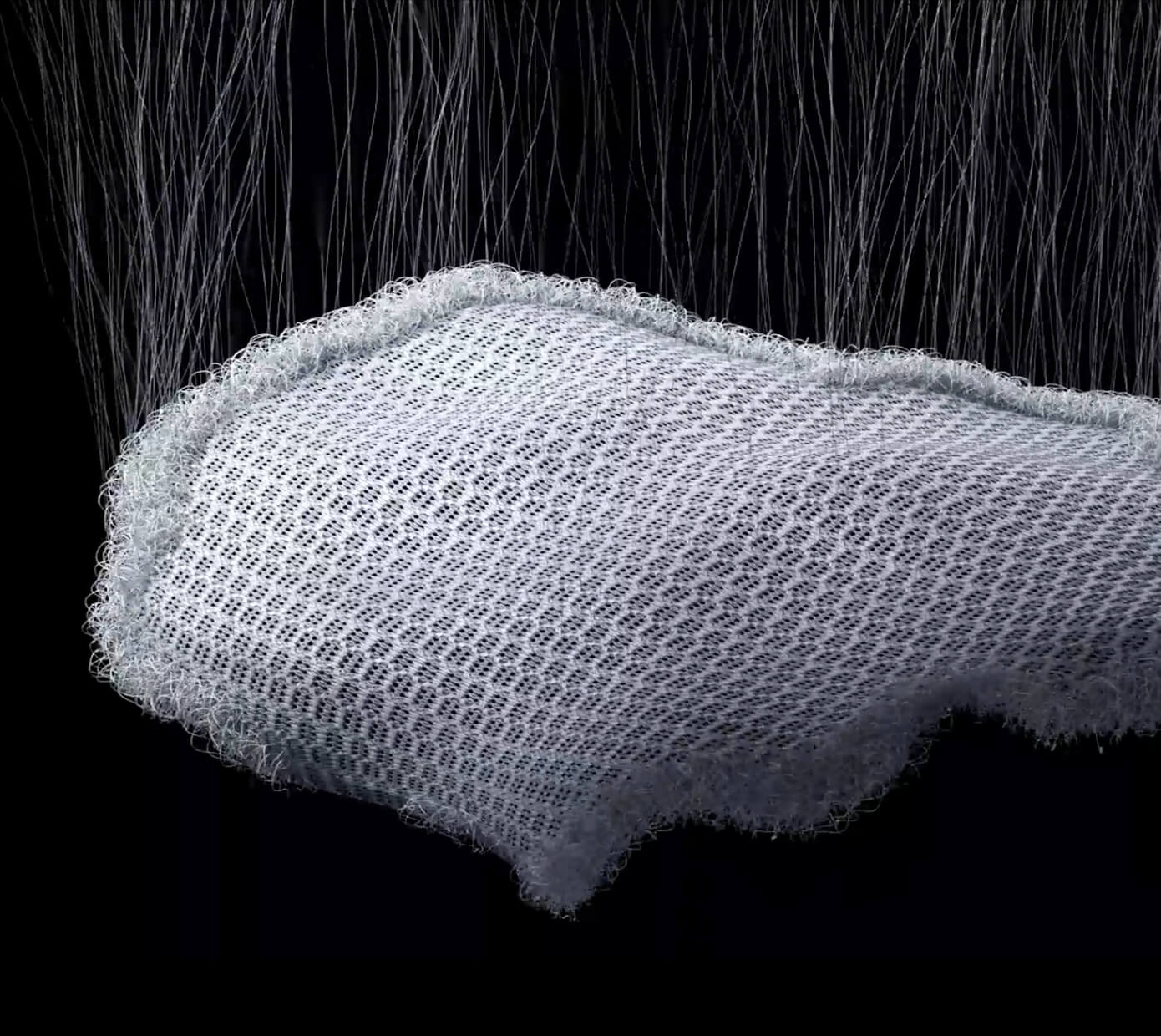 Close-up of the breathable mesh fabric on a HBADA ergonomic chair